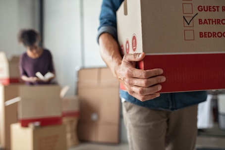 Man holding moving boxes