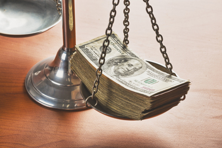 money on scales