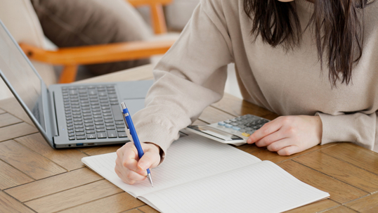 woman calculating expenses