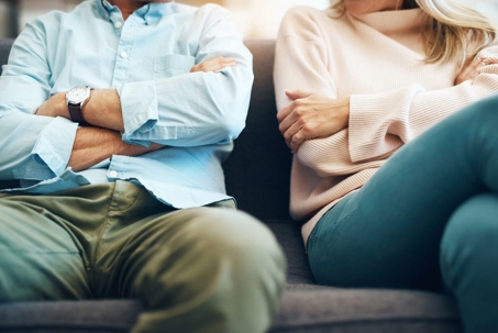 couple sitting next to each other on couch