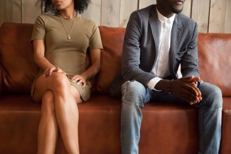 Couple sitting in attorney's office