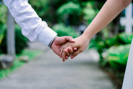Newly Wed holding hands for their prenup shoot